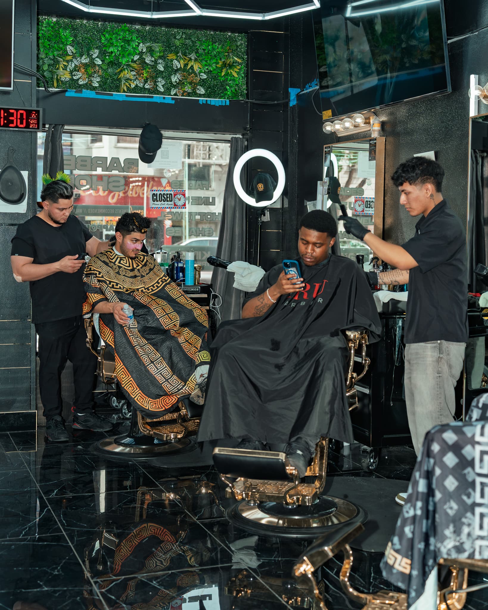 Professional barber at Lion's Den Shave Parlor